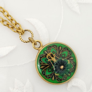 Antique-Gold-Round-Pendant-Necklace-with-Transparent-Green-Resin-Filigrees-and-Flower-1